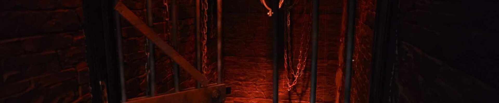 Haunting Halloween prison set design we created for a nightclub event.