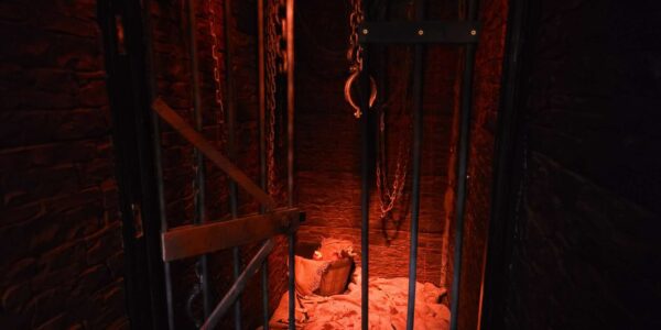 Haunting Halloween prison set design we created for a nightclub event.