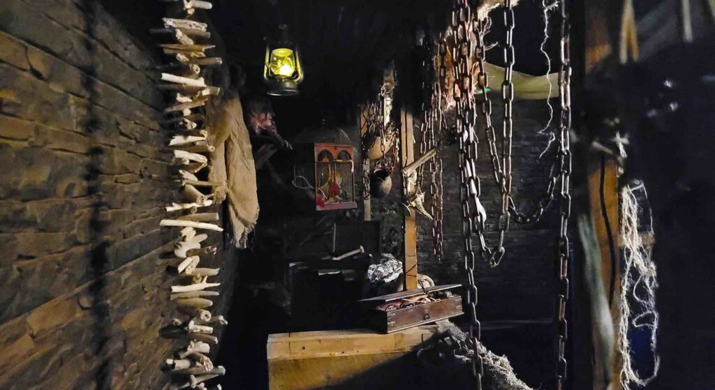 Hanging chains, ropes and relic, part of a bespoke Egyptian themed installation at a venue.