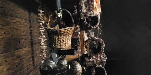 Hanging rattan baskets and relics, props used for event decoration for an Egypt theme.