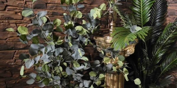Palm trees and greenery used as event decor for an Egyptian themed ambience.