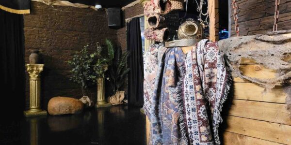 Egyptian event theming including textiles and plinths used as event decor.