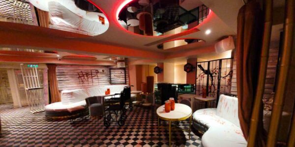 TABU nightclub in London transformed with an Asylum event theme including wheelchairs for seating, mason jars full of organs, checkered flooring and bloodied decor.