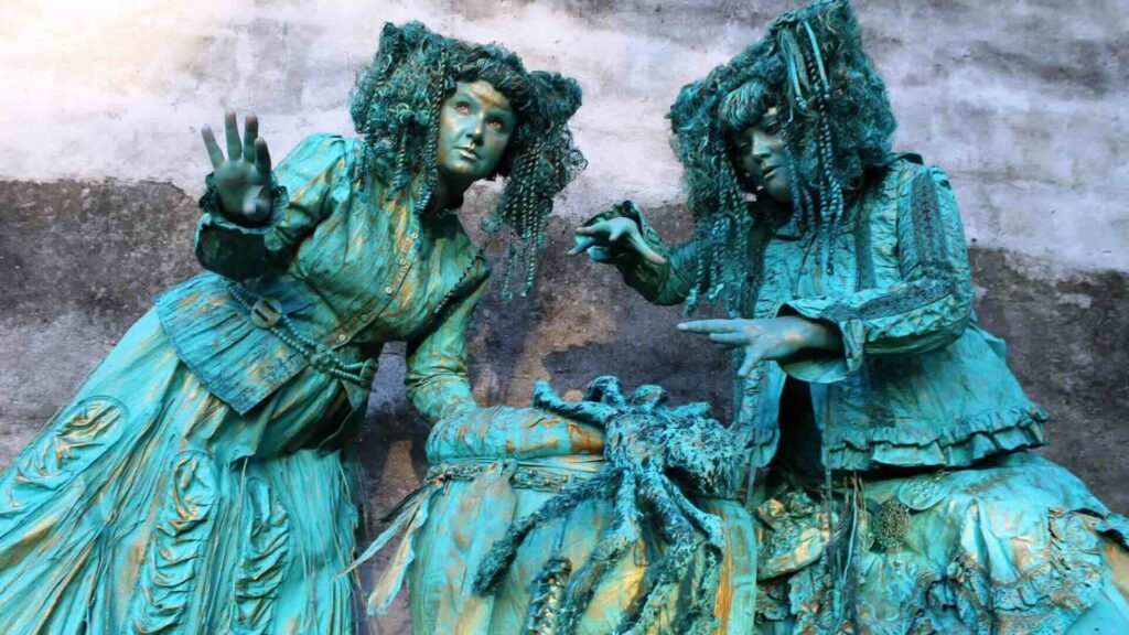 A pair of turquoise living statues
