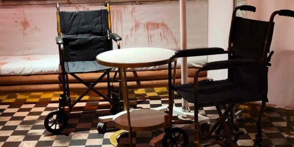 Step into the madness this Halloween at TABU—featuring an Asylum setup with two wheelchairs, a hospital divider, and a treatment table straight out of your nightmares.