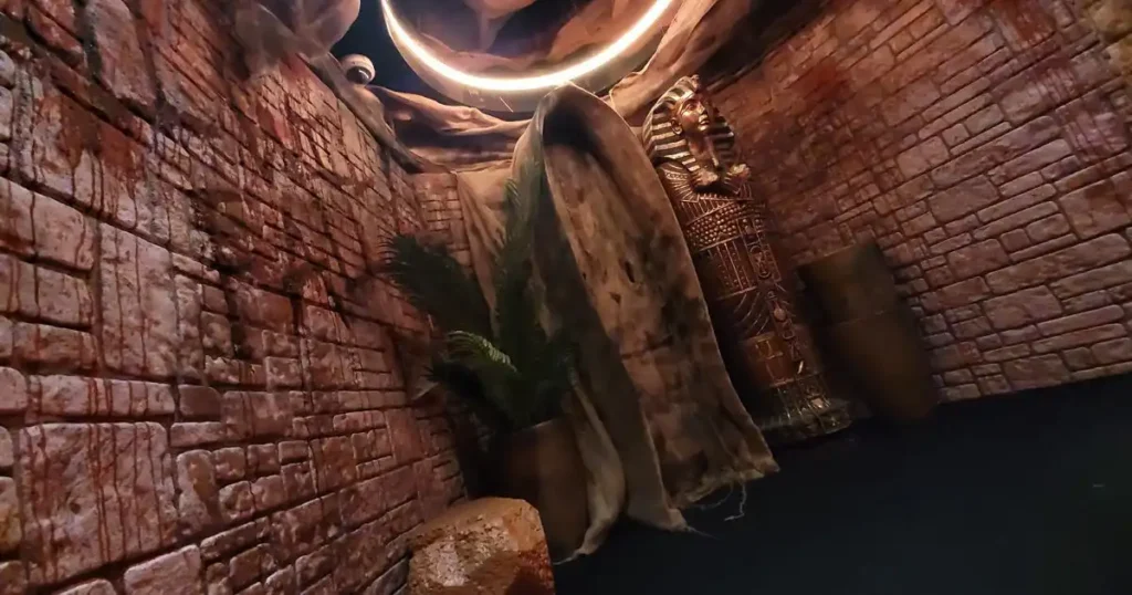 A fully built Egyptian-themed entrance installation inspired by Tutankhamun’s tomb, forming part of the venue’s dramatic Halloween transformation.