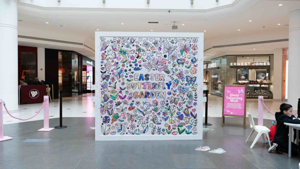A giant colouring wall at a shopping centre event.