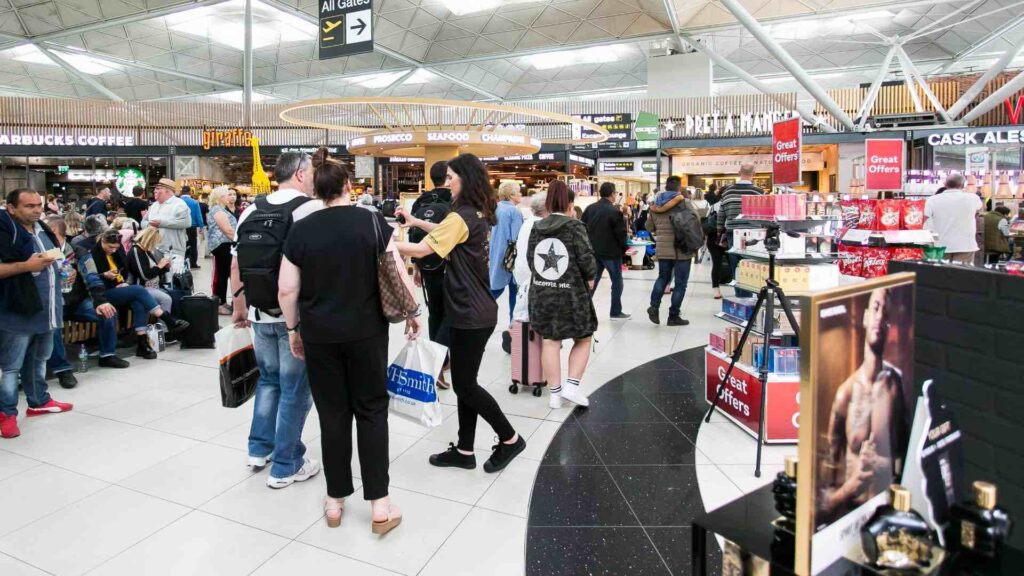 A shopping centre brand activation with a bustling crowd.