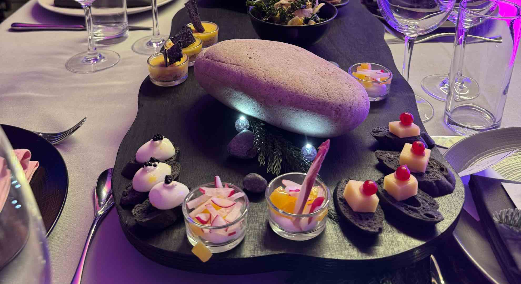 Nordic themed gala event dinner service, with natural rocks and immersive dining experience.