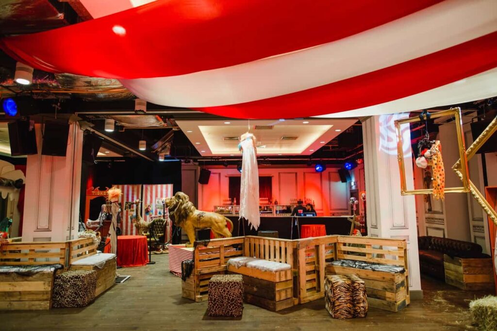 A twisted circus themed Halloween party with draping, decor and more.