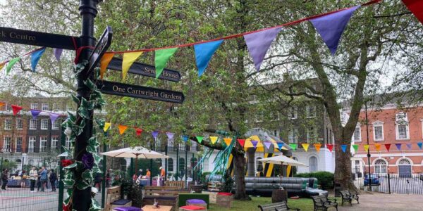 Colourful-Bunting-Hanging-In-Park-For-Events.jpg