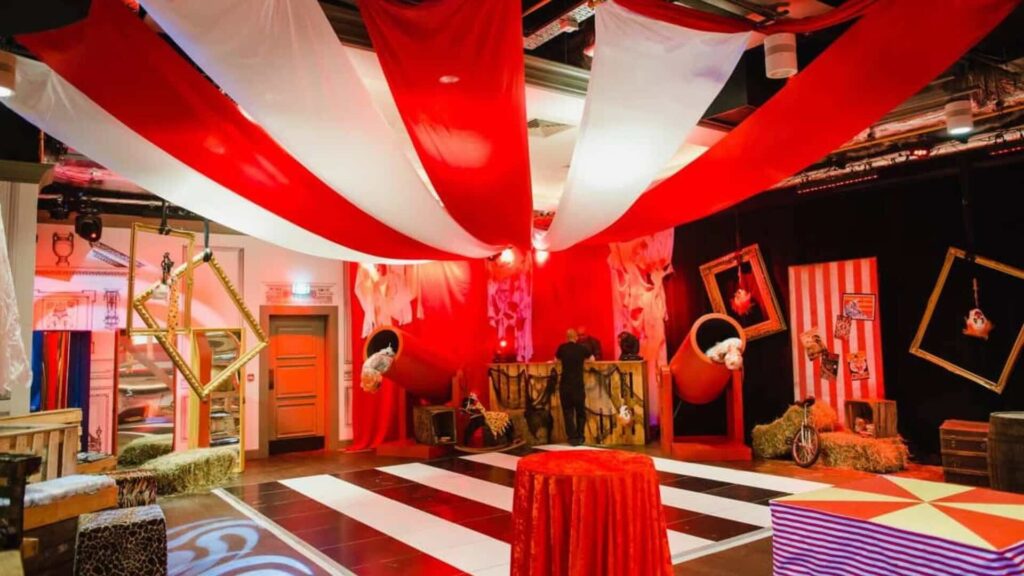 Halloween Circus Party venue transformation showcasing dance floor, set design and more.