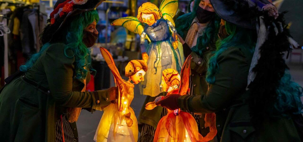 Illuminated-fairy-puppet-show-intricate-glowing-puppets
