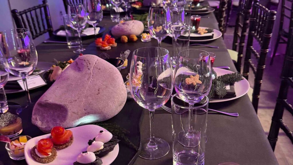 A Northern Lights-themed dinner for a themed Christmas party.