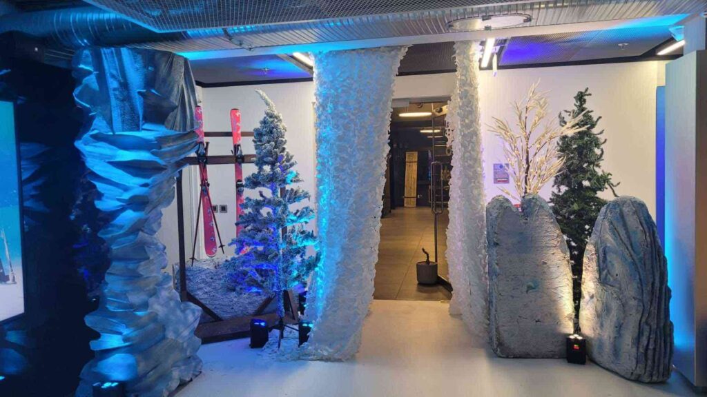 We added styling to the entrance of this office using a ski lodge and chalet as inspiration for this Winter Wonderland theming.