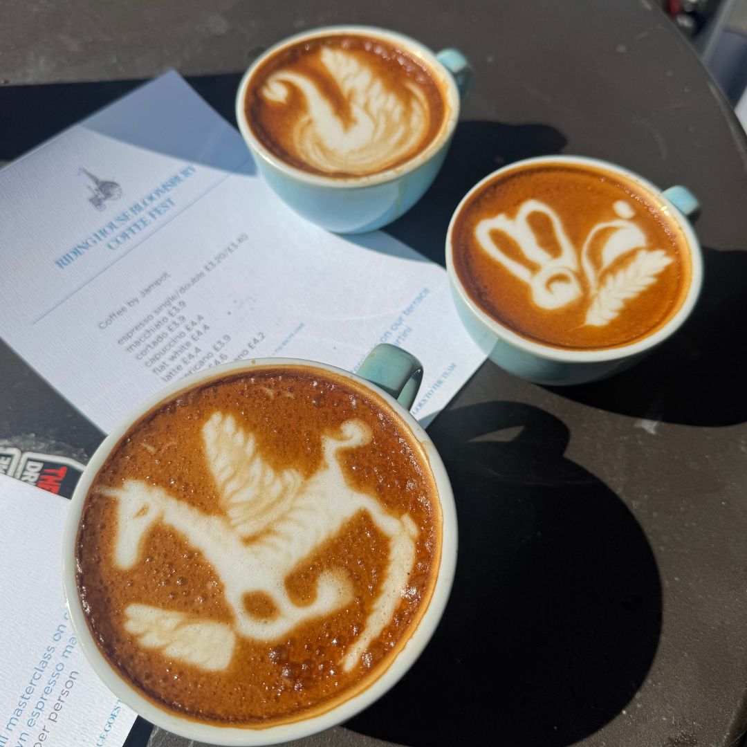Unicorn, swan and rabbit art in coffee foam.