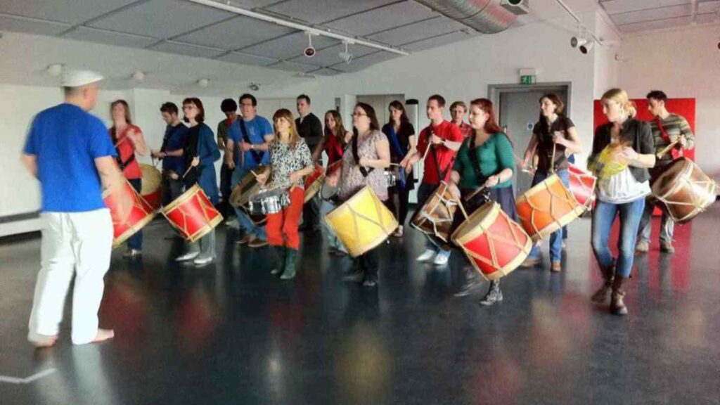 A group of people participating in a team building workshop.