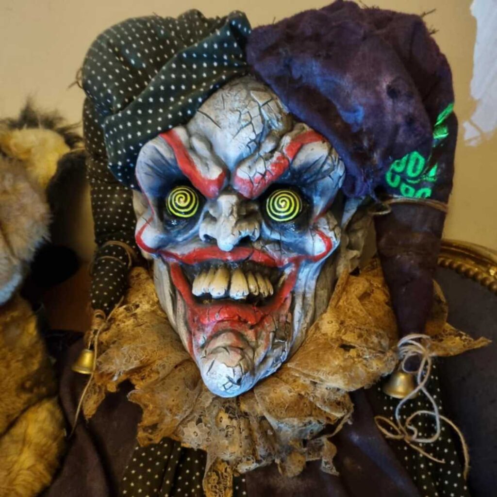 Spooky jack in the box costume scare actor available to hire for Halloween events.