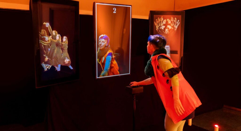 Consumer interacting with digital mirror installation at retail event.