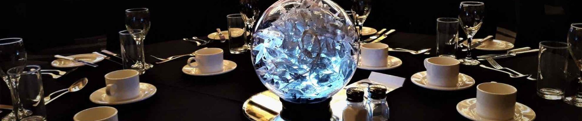 Silver sparkling leaf globe table centrepiece design. Silver sparkling leaf globe table centrepiece design.