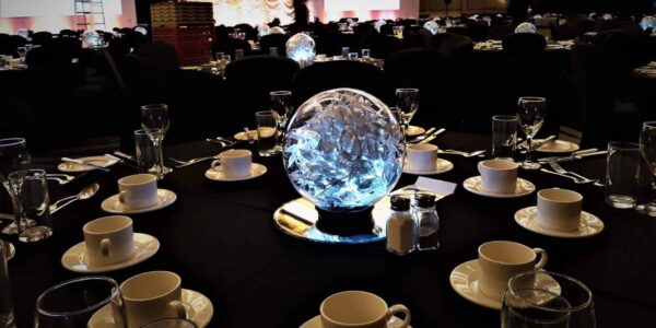 Silver sparkling leaf globe table centrepiece design.