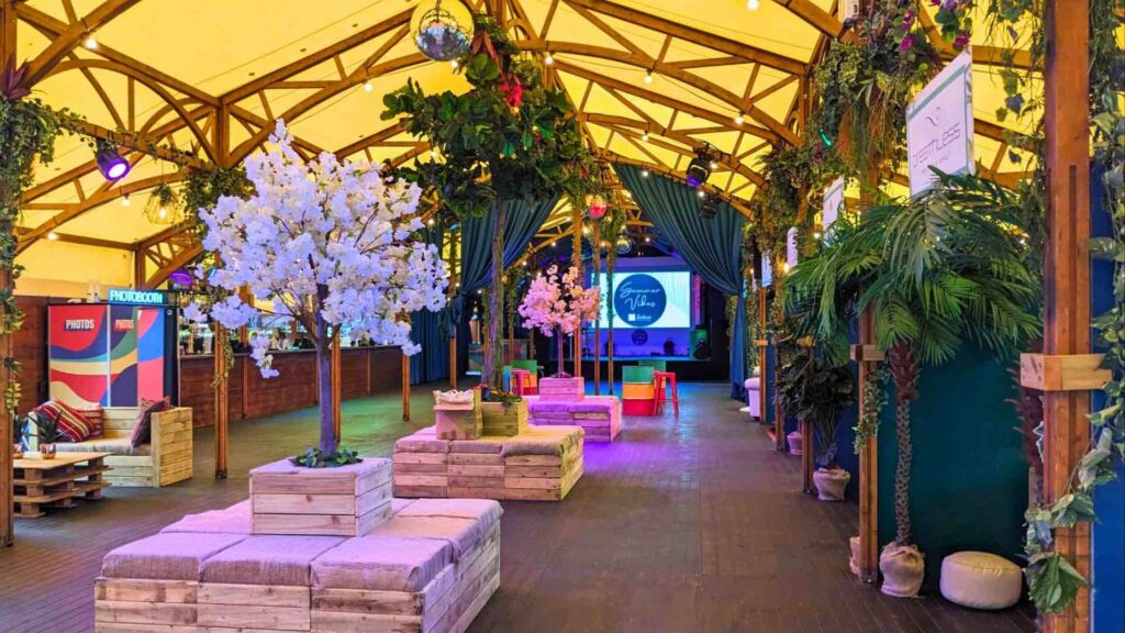 A vibrant festival themed event space with sustainable event services provided by Julia Charles Event Management.