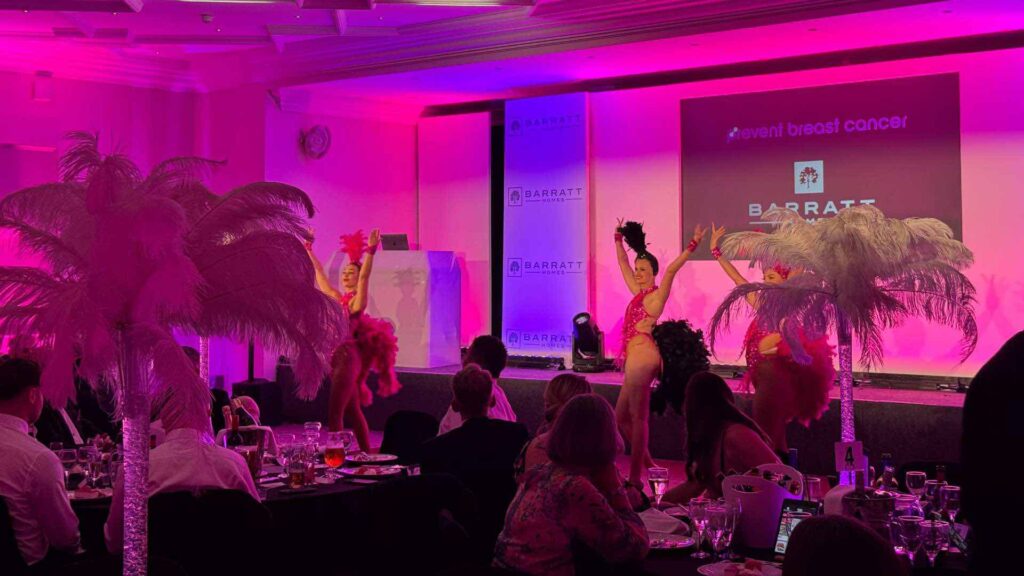 Show girls entertaining crowds at Barratt Homes gala dinner event.