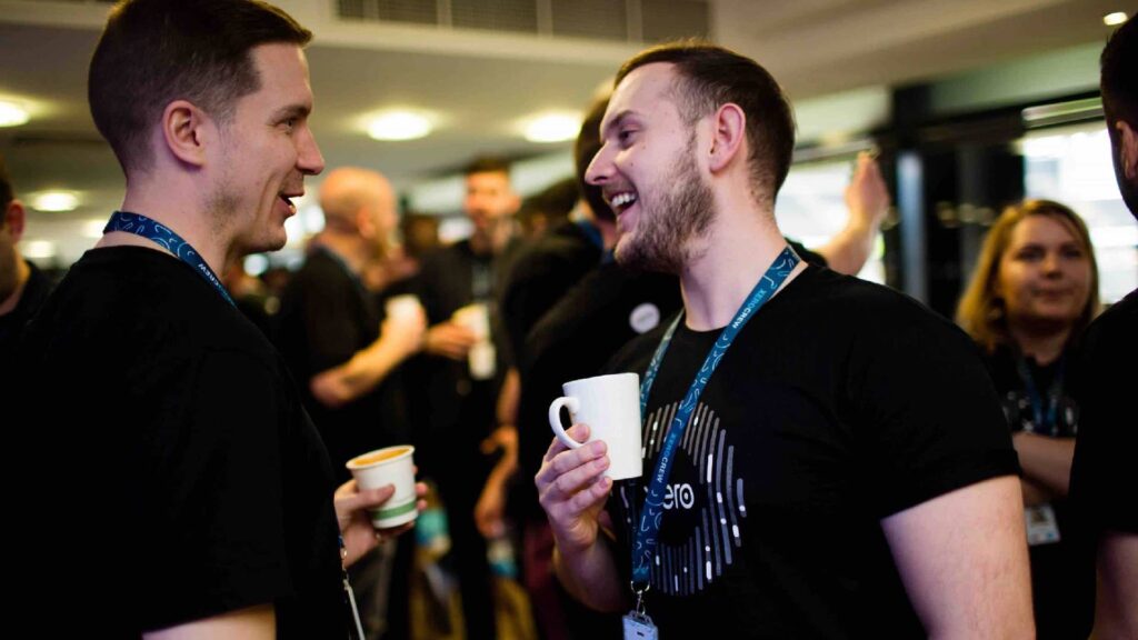 Delegates enjoying coffee during a networking break.