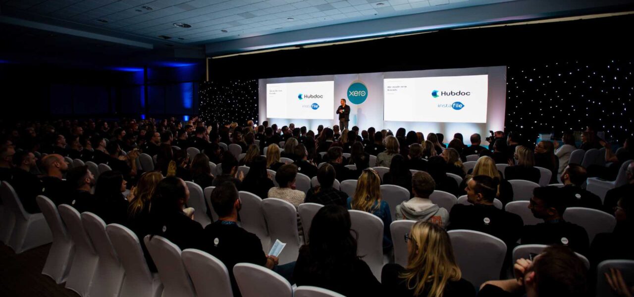 Speaker-On-Stage-Entertaining-XERO-Conference-Delegates