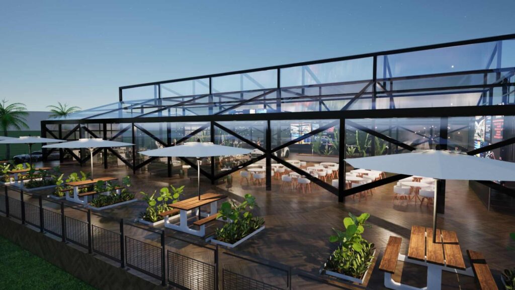 An atrium marquee render of a large glass structure with a few metal panes between. Inside is decor such as seating and cars.