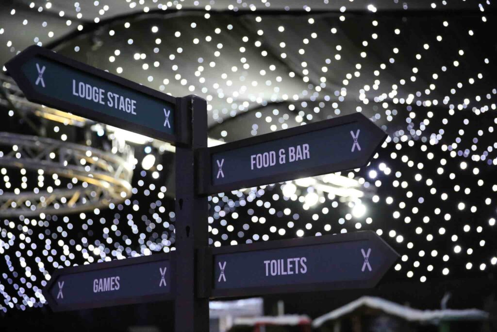 Close-ups of signage used at the Gymshark lodge event.