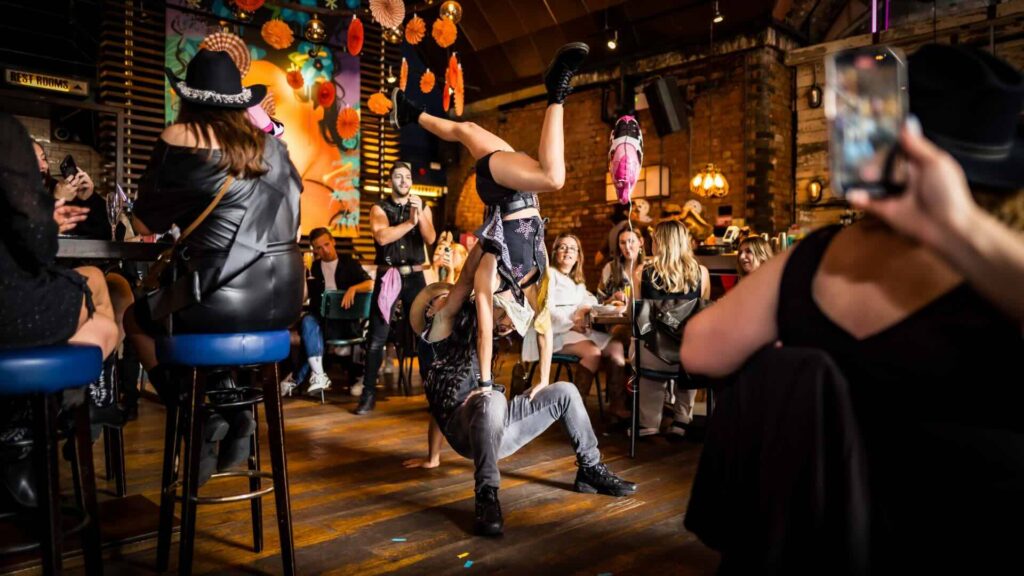 Cowboy party entertainment for a corporate summer event, with dancers, fire shows and more.
