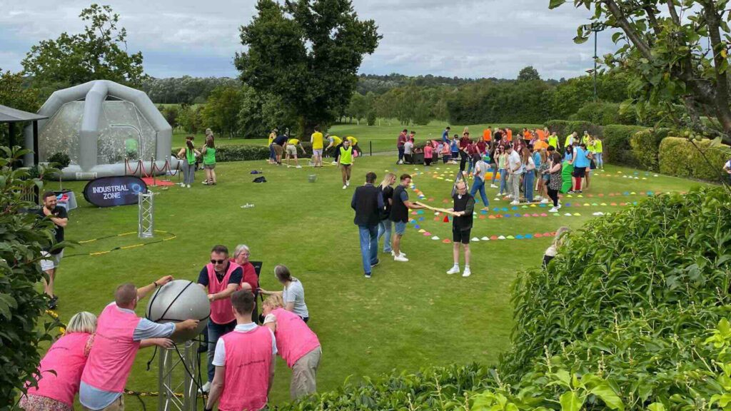 A crystal challenge experience with teams competing outdoors.