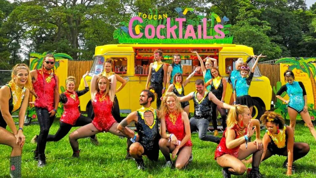 An immersive cocktail bar experience with performers.
