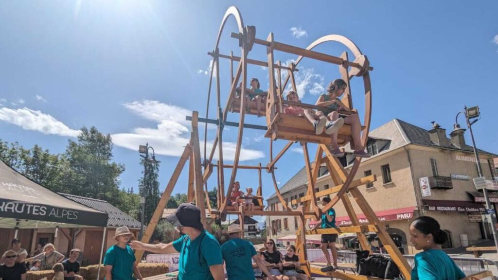 A sustainable fun fair ride option at a public event.