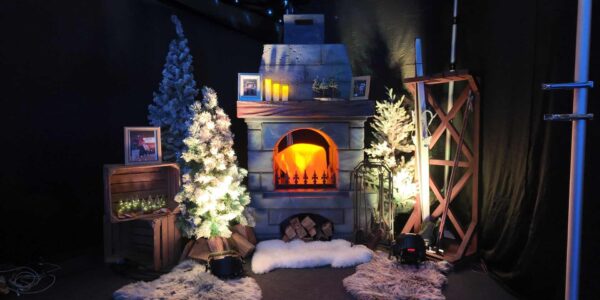 Alpine lodge themed photo booth scene.