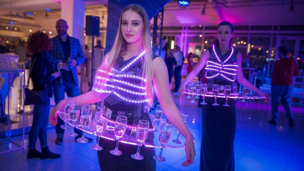 A sci-fi themed roaming table hostess at a gala dinner event.