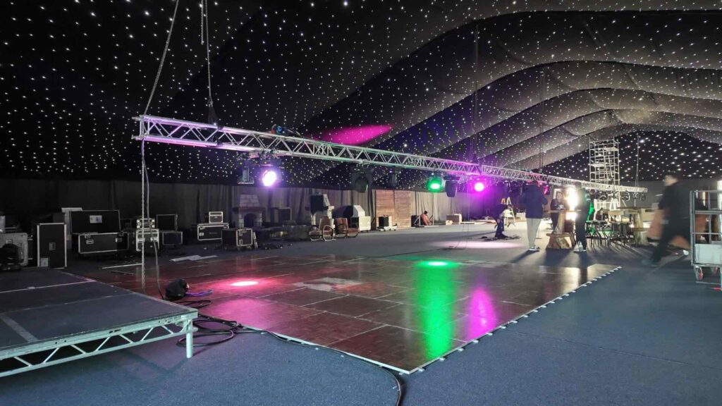 Team setting up main space at GYMSHARK Christmas party.
