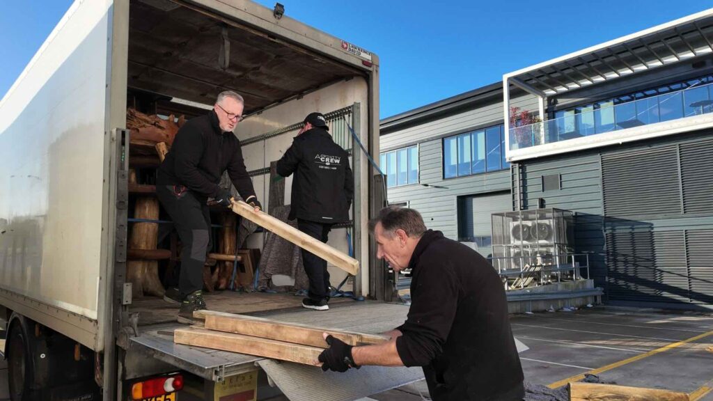 Team unloading delivery van for GYMSHARK event production.