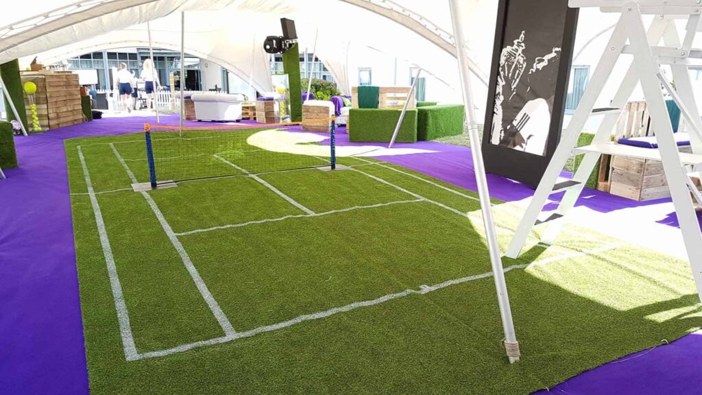 Photo of a centre-court stage concept with tennis-cue set elements