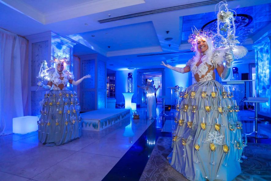 A bespoke winter wonderland event designed with scenic installations and lightings