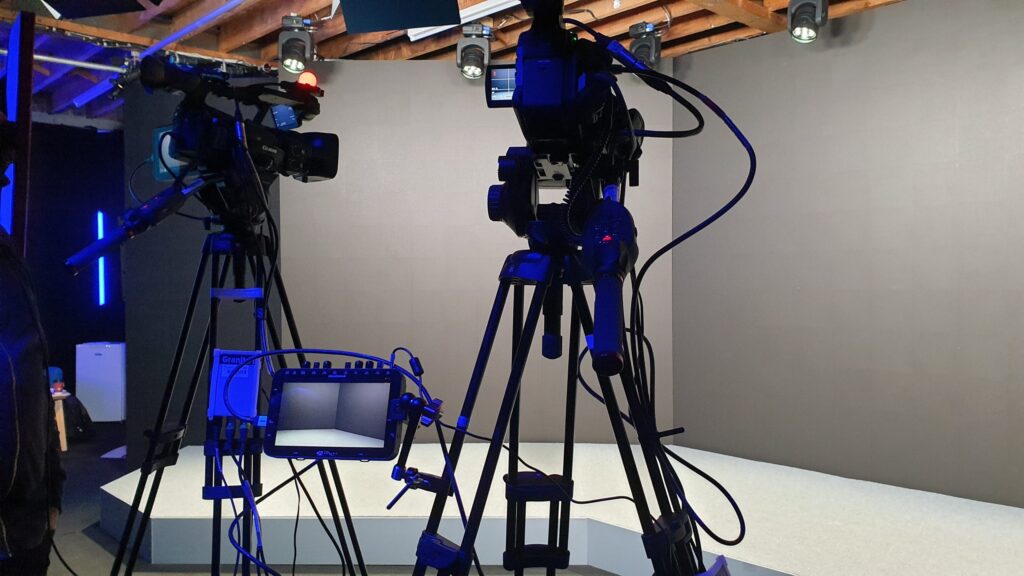 Virtual product launch studio with branded set design and live-streamed broadcast
