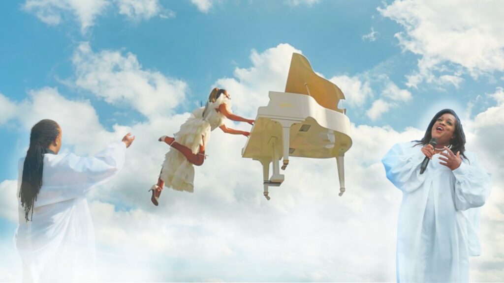 Aerial piano show with gospel choir a unique bespoke show concept created by Julia Charles Events.