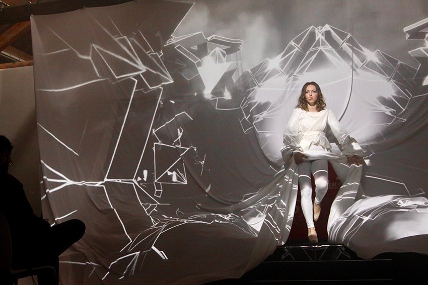 3D projection mapping turning venue walls into a live animated brand narrative