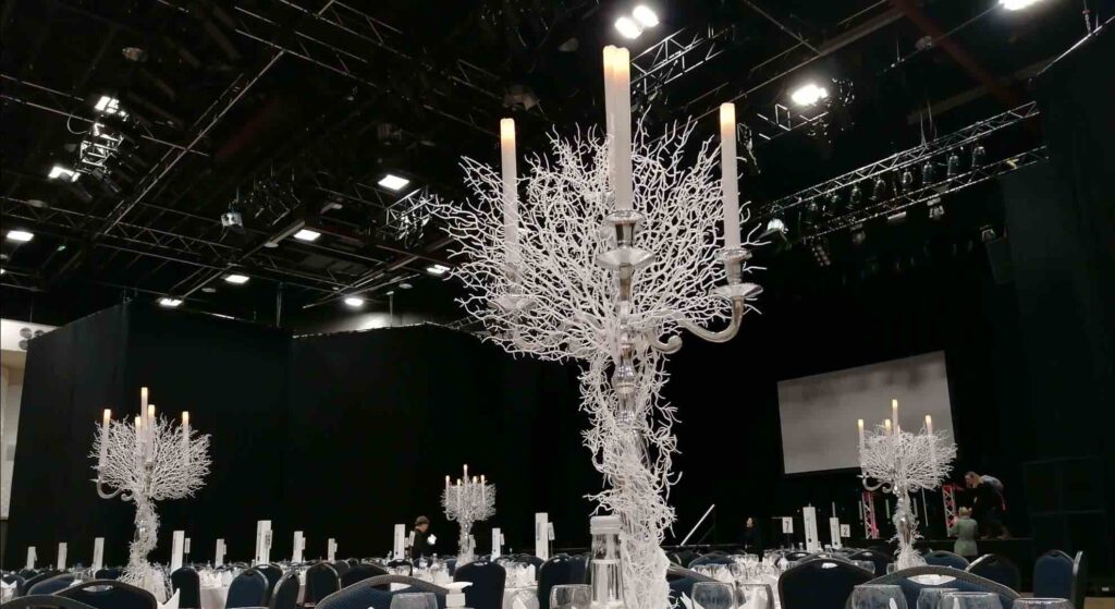 A Winter themed candelabra table centrepiece for Christmas events.