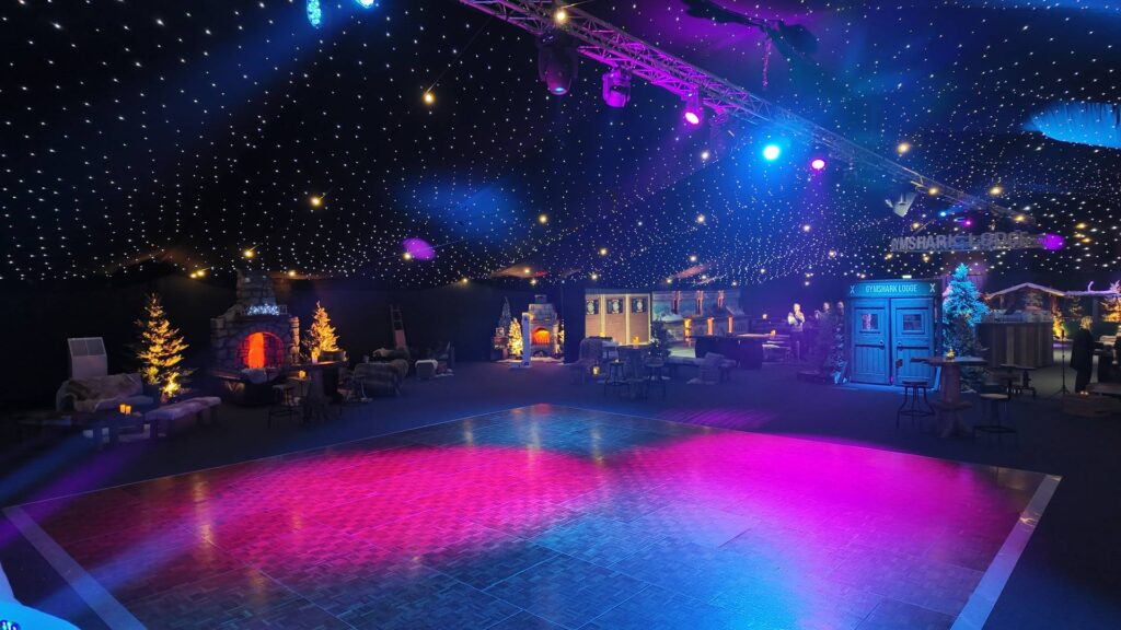 Party lighting state across the dancefloor at an Alpine Lodge themed corporate Christmas party
