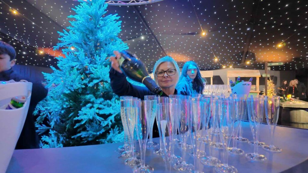 Guests enjoying their drinks in a bespoke bar