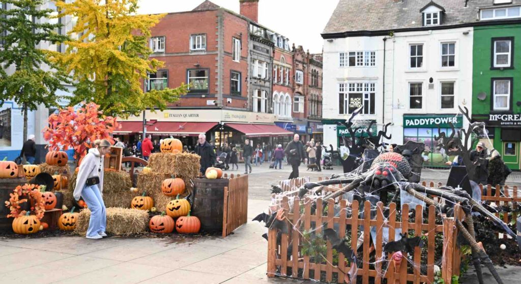 Two Halloween installations positioned across a Liverpool city centre square during the Liverpool BID activation