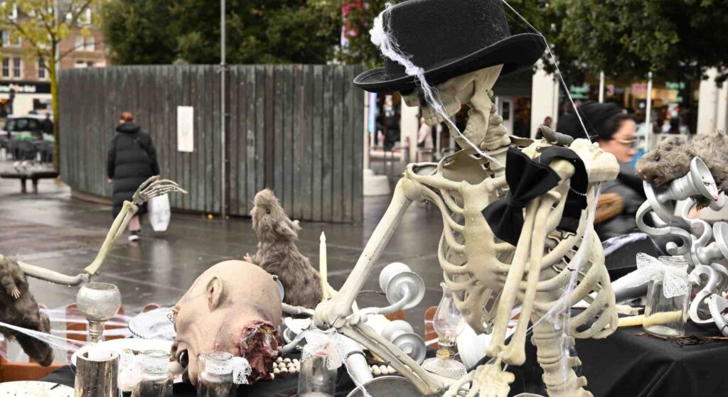 Skeleton tea party set installed among shops in Liverpool city centre