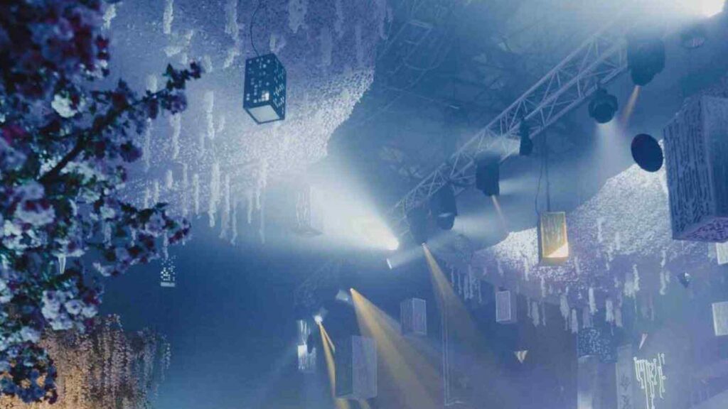 Event production crew rigging lighting and AV for a London event
